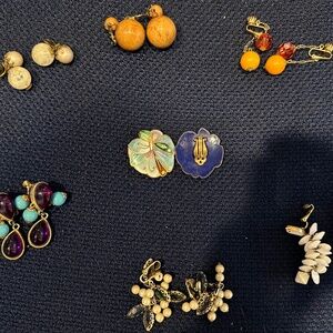 7 pairs of Vintage Clip on  Earrings one is  Designer too!